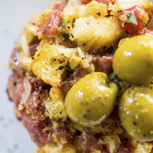 Bellota Pork Tartar with Anchovy Stuffed Olives| Foods & Wines from Spain