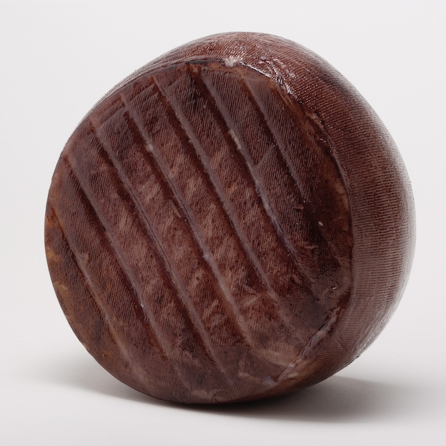 Wine-bathed Murcian cheese
