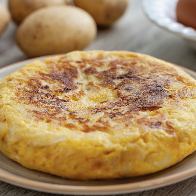 Front view of spanish potato omelet on table
