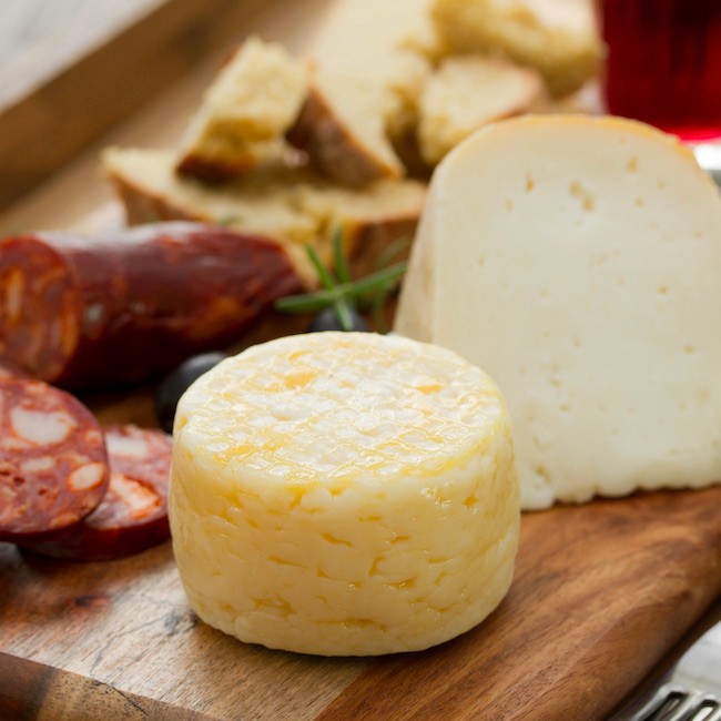 cheese with smoked sausage, bread and red wine