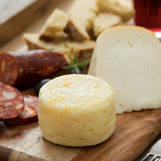 cheese with smoked sausage, bread and red wine
