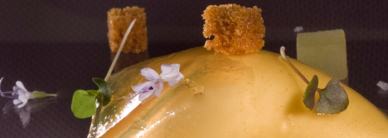 Spanish recipe: Crémeux of Flor de Guía cheese with a rosemary honey veil and micro-basil. Photo by: Toya Legido/©ICEX.