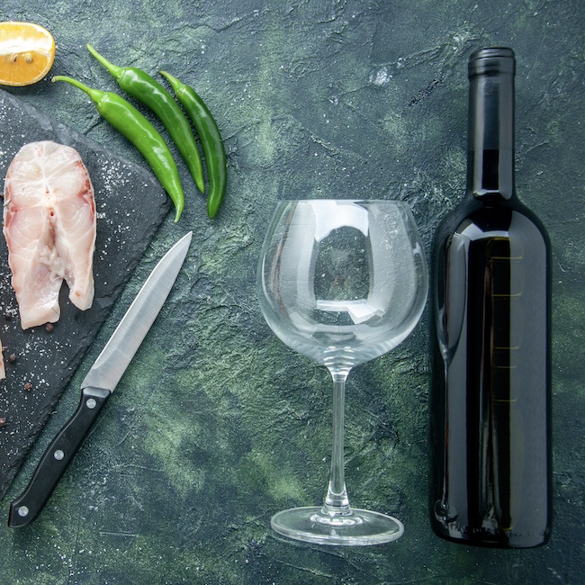 top view fresh fish slices on dark background dish salad seafood ocean meat sea wine pepper food water meal